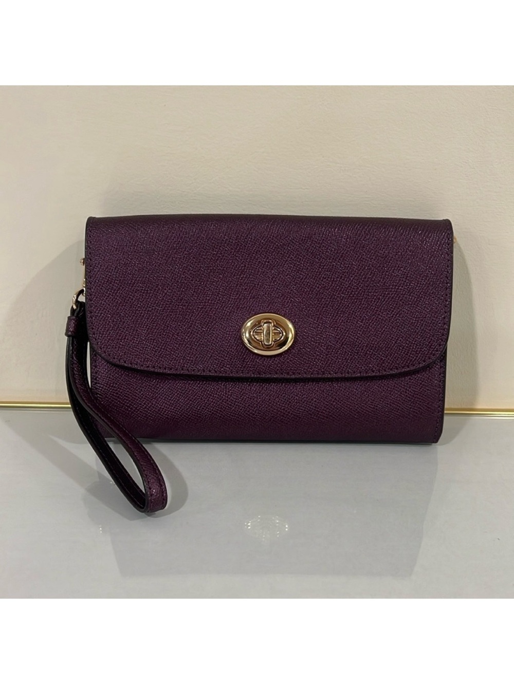 Coach Elegant Metallic Purple Wristlet Clutch.